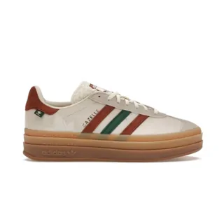 Cream platform terrace trainer with a red and green side stripe