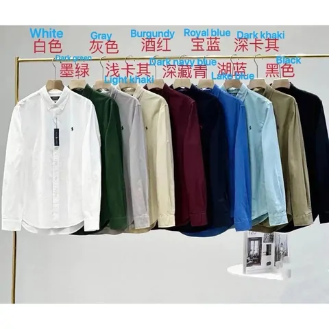 Ten long-sleeve oxford shirts hung in a row with their colour names written in Chinese and English above them