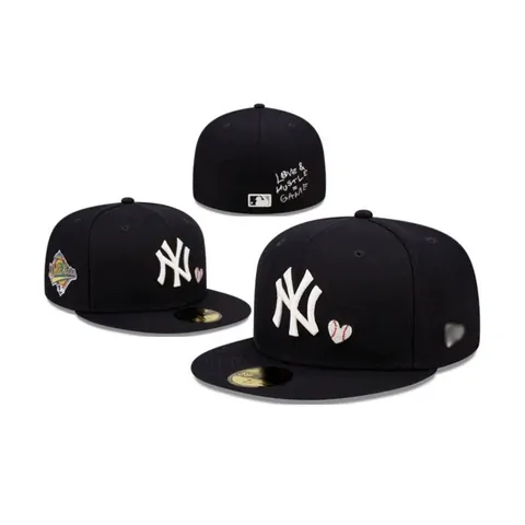 Navy and black fitted flat-brim baseball caps with white embroidered lettering
