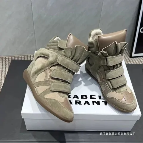 Khaki suede high-top with hook-and-loop straps, shown on its shoe box